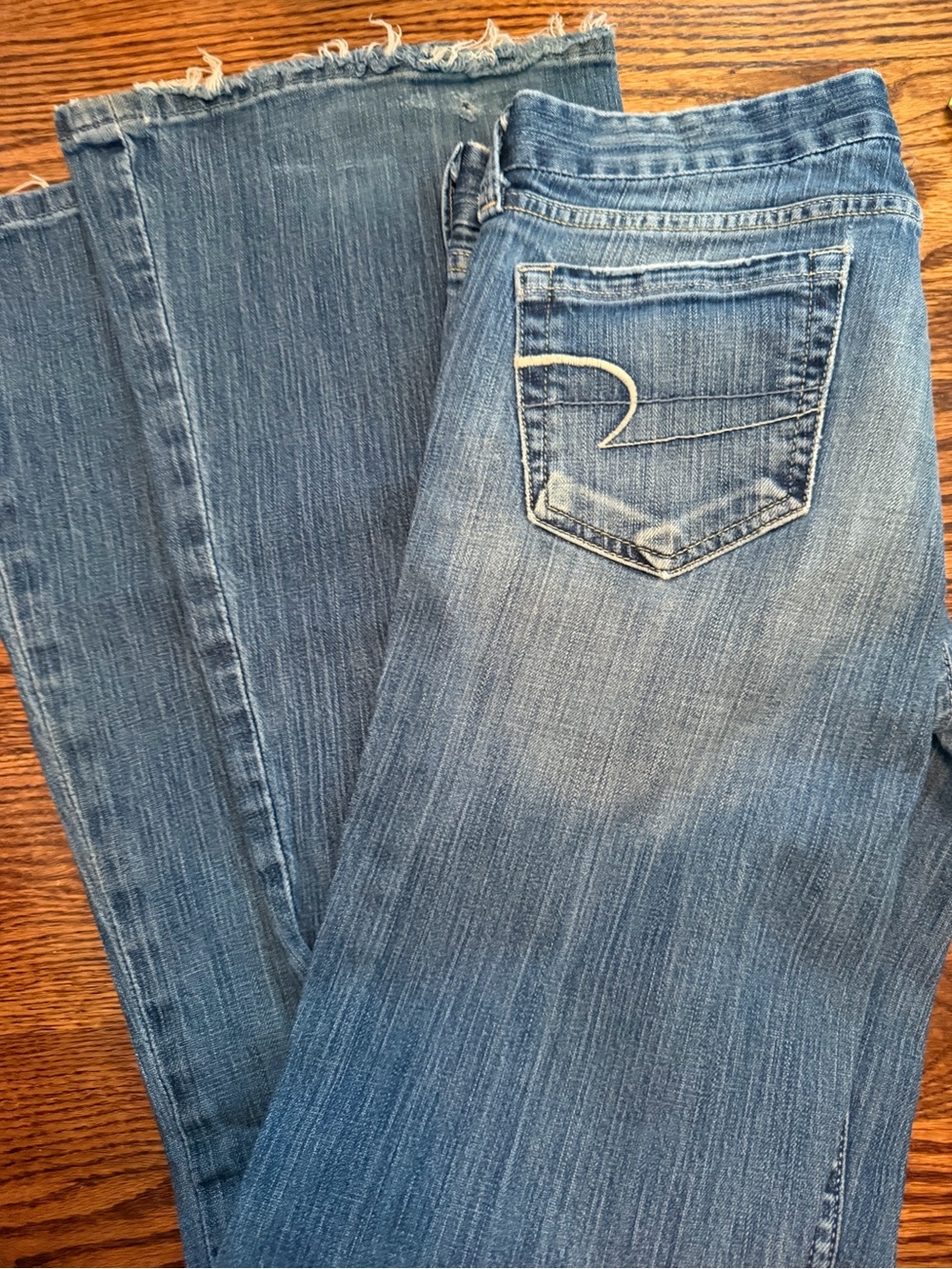 4 - American Eagle AEO Women’s Light Blue Bootcut Jeans, Low waist